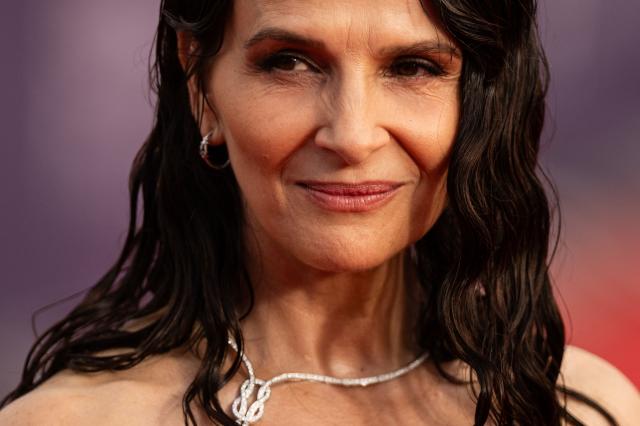 French actress Juliette Binoche poses on the red carpet at the opening of the 52nd edition of the Deauville American film festival, in Deauville, northwestern France on September 4, 2026. (Photo by Guillaume SALIGOT / AFP)