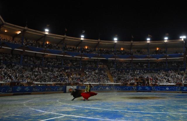 Peruvian matador Pedro Luis performs a pass on a Zacarias-Moreno bull at the Marcel-Dangou arena in Bayonne, southwestern France, on September 4, 2026. (Photo by Gaizka IROZ / AFP)