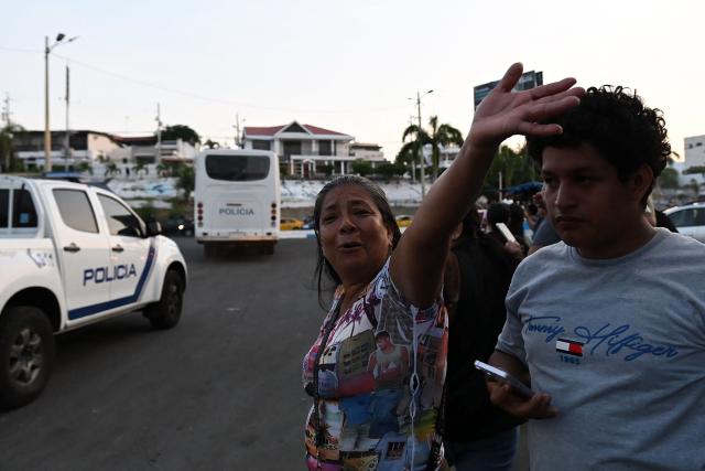 Relatives of detained fishermen react after they were taken from the port of Manta to the Community Surveillance Unit (UVC) by National Police officers in Manta, Ecuador, on September 4, 2026. The US military said on September 4 that it had blown up another boat allegedly linked to Ecuadoran drug gangs, bringing to three the number of vessels it has sunk in the area in the past week. (Photo by ARIEL OCHOA / AFP)