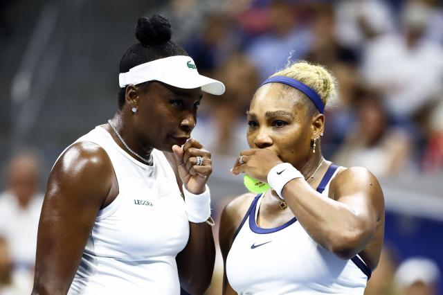 USA's Serena Williams (R) and Venus Williams talk during their women's doubles first-round tennis match against Australia's Maya Joint and Taiwan's Chan Hao-ching on day six of the US Open tennis tournament at the USTA Billie Jean King National Tennis Center in New York City on September 4, 2026. (Photo by CHARLY TRIBALLEAU / AFP)