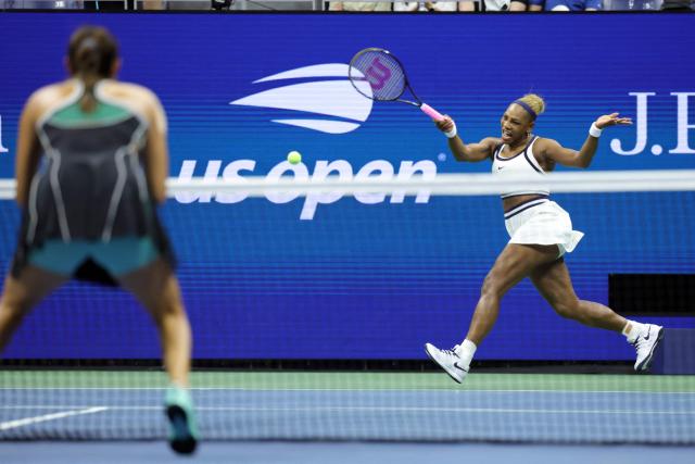 USA's Serena Williams (R) hits a return during the women's doubles first-round tennis match, playing alongside her sister Venus Williams, against Australia's Maya Joint and Taiwan's Chan Hao-ching on day six of the US Open tennis tournament at the USTA Billie Jean King National Tennis Center in New York City on September 4, 2026. (Photo by KENA BETANCUR / AFP)