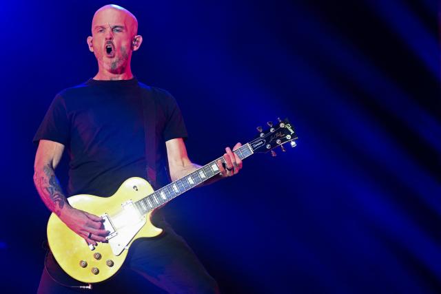 US guitarist Zach Blair of US punk rock band Rise Against performs during the first day of Rock in Rio music festival at Rio 2016 Olympic Park in Rio de Janeiro, Brazil on September 4, 2026. (Photo by Mauro PIMENTEL / AFP)