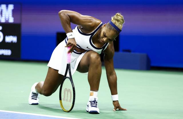 USA's Serena Williams braces herself with one hand against the court during the women's doubles first-round tennis match, playing alongside her sister Venus Williams, against Australia's Maya Joint and Taiwan's Chan Hao-ching on day six of the US Open tennis tournament at the USTA Billie Jean King National Tennis Center in New York City on September 4, 2026. (Photo by CHARLY TRIBALLEAU / AFP)