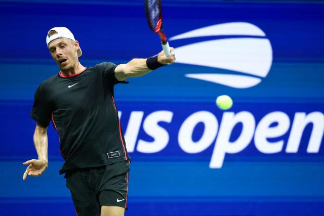 Canada's Denis Shapovalov returns the ball to USA's Ben Shelton during their men's singles third round tennis match on day six of the US Open tennis tournament at the USTA Billie Jean King National Tennis Center in New York City on September 4, 2026. (Photo by CHARLY TRIBALLEAU / AFP)