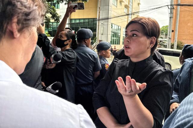Philippines Vice President Sara Duterte arrives at the court building following her arrest warrant in Manila on September 5, 2026. A Philippine court on September 4 issued an arrest warrant for Vice President Sara Duterte over an alleged death threat against the country's president, with her defence team saying she would "exercise all her legal remedies". (Photo by Ted ALJIBE / AFP)