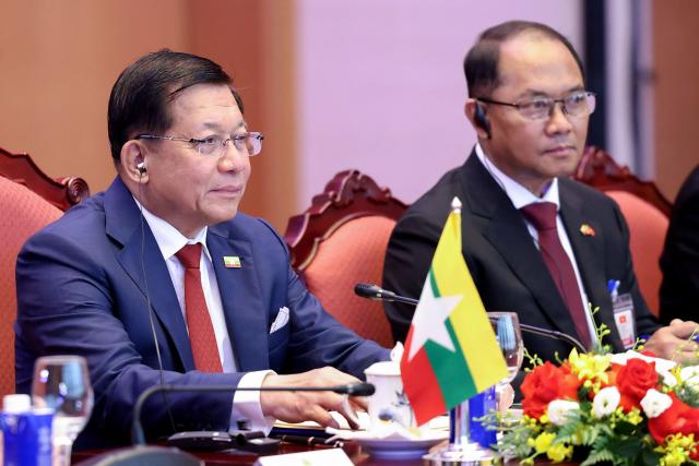 Myanmar's President Min Aung Hlaing (L) attends a meeting with Vietnam's President To Lam at the National Assembly House in Hanoi September 5, 2026. (Photo by Quang Nguyen / AFP)