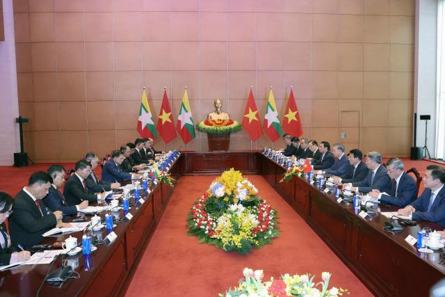 Myanmar's President Min Aung Hlaing (6th L) and Vietnam's President To Lam (5th R) attend a meeting  at the National Assembly House in Hanoi September 5, 2026. (Photo by Quang Nguyen / AFP)