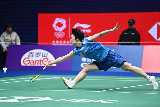 Japan's Akane Yamaguchi hits a return to South Korea's An Se-young during their women's singles semi-final match at the 2026 China Masters badminton tournament in Shenzhen, southern China's Guangdong province on September 5, 2026. (Photo by CN-STR / AFP) / China OUT