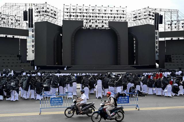Motorcyclists ride past the stage for the 2026 Miss World pageant in Nha Trang, Vietnam's Khanh Hoa province on September 5, 2026. (Photo by Nhac NGUYEN / AFP)