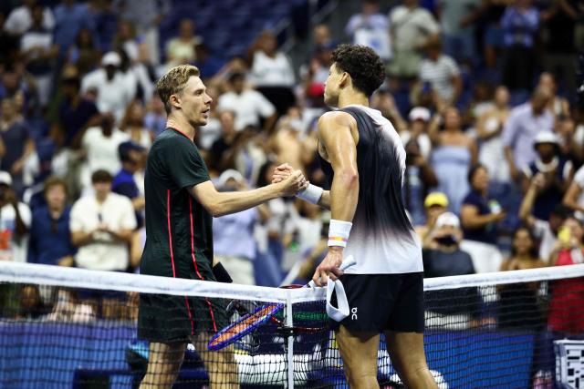 USA's Ben Shelton (R) and Canada's Denis Shapovalov shake hands after Shelton's victory in their men's singles third-round tennis match on day six of the US Open tennis tournament at the USTA Billie Jean King National Tennis Center in New York City in the early hours of September 5, 2026. (Photo by CHARLY TRIBALLEAU / AFP)
