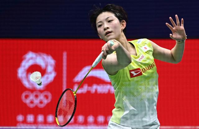 Japan's Tomoka Miyazaki hits a return to China's Wang Zhiyi during their women's singles semi-final match at the 2026 China Masters badminton tournament in Shenzhen, southern China's Guangdong province on September 5, 2026. (Photo by CN-STR / AFP) / China OUT