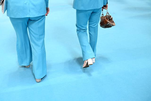 Delegates arrive on the third day of the annual Reform UK party conference at the NEC in Birmingham, central England on September 5, 2026. (Photo by Oli SCARFF / AFP)