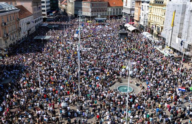 Protesters gather on Ban Jelacic Square during a demonstration to demand action over the illegal dumping of hazardous waste in Croatia's Lika region, in Zagreb, on September 7, 2026. Thousands rallied in Zagreb seeking an immediate cleanup of thousands of tonnes of hazardous waste still unrecovered after years of illegal dumping in one of the country's most pristine regions, and to demand accountability for those responsible. (Photo by MARKO PERKOV / AFP)