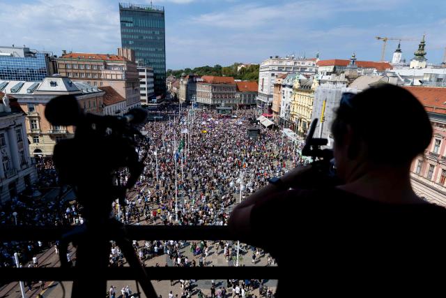 Protesters gather on Ban Jelacic Square during a demonstration to demand action over the illegal dumping of hazardous waste in Croatia's Lika region, in Zagreb, on September 7, 2026. Thousands rallied in Zagreb seeking an immediate cleanup of thousands of tonnes of hazardous waste still unrecovered after years of illegal dumping in one of the country's most pristine regions, and to demand accountability for those responsible. (Photo by MARKO PERKOV / AFP)