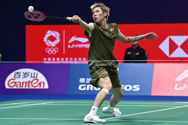 Hong Kong's Lee Cheuk Yiu hits a return to France's Christo Popov during their men's singles semi-final match at the 2026 China Masters badminton tournament in Shenzhen, southern China's Guangdong province on September 5, 2026. (Photo by CN-STR / AFP) / China OUT