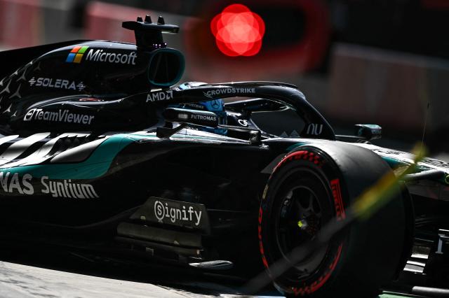 Mercedes' British driver George Russell drives on the pit lane during the third practice session of the Italian Formula One Grand Prix at the Autodromo Nazionale Monza circuit in Monza, northern Italy on September 5, 2026. (Photo by Marco BERTORELLO / AFP)