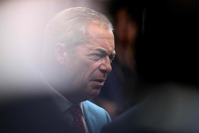 Reform UK Leader Nigel Farage reacts on the third day of the annual Reform UK party conference at the NEC in Birmingham, central England on September 5, 2026. (Photo by Oli SCARFF / AFP)