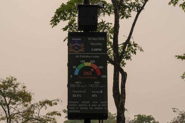 An Air Pollution Index reading board is displayed as haze from Indonesia's forest fires shrouds Kuching, the capital city of Sarawak state on the island of Borneo on September 5, 2026. (Photo by Mohd Rasfan / AFP)