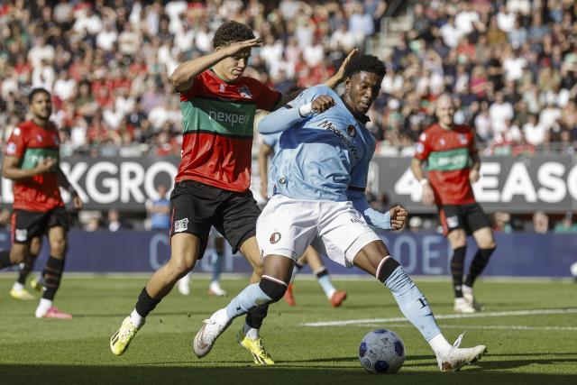 (LtoR) Clement Bischoff of NEC Nijmegen and Gaoussou Diarra of Feyenoord fight for the ball during the Dutch Eredivisie football match between NEC Nijmegen and Feyenoord Rotterdam at Goffertstadion in Nijmegen on September 5, 2026. (Photo by Bart Stoutjesdijk / ANP / AFP) / Netherlands OUT