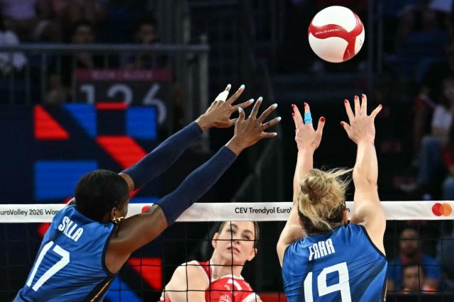 Poland’s  #3 Magdalena Stysiak, spikes the ball as Italy’s #17 Myriam Fatime Sylla and #19 Sarah Luisa Fahr jump to block it during the Women's European Volleyball Championship EuroVolley semi final match between Poland and Italy at Sinan Erdem Sports Hall in Istanbul, on September 5, 2026. (Photo by Ozan KOSE / AFP)