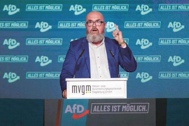 Hans-Joachim Tillschneider of the far-right Alternative for Germany (AfD) party, speaks at a campaign event in Magdeburg, eastern Germany, on September 5, 2026, one day before regional elections in the eastern federal state of Saxony-Anhalt. Germany faces a landmark regional election on September 6, 2026 in the ex-communist east where the far-right Alternative for Germany (AfD) party is easily expected to win and has its sights on heading its first state government. While it is far from assured that Alternative for Germany will win enough votes to rule the state alone, topping the polls in Saxony-Anhalt state would heap pressure on Chancellor Friedrich Merz and spell another boost for the anti-immigration party. (Photo by Ronny HARTMANN / AFP)