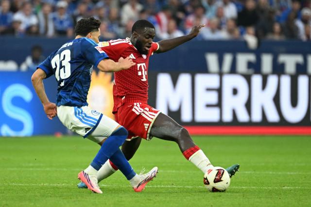 Schalke's German midfielder #23 Soufiane El-Faouzi (L) and Bayern Munich's French defender #02 Dayot Upamecano vie for the ball during the German first division Bundesliga football match between Schalke 04 and FC Bayern Munich in Gelsenkirchen, western Germany on September 5, 2026. (Photo by UWE KRAFT / AFP) / DFL REGULATIONS PROHIBIT ANY USE OF PHOTOGRAPHS AS IMAGE SEQUENCES AND/OR QUASI-VIDEO