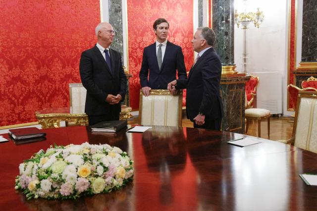 In this pool photograph distributed by the Russian state agency Sputnik, Russia's presidential envoy Kirill Dmitriev (L) speaks with US President Donald Trump's son-in-law Jared Kushner (C) and US Special Envoy Steve Witkoff (R) prior to their meeting with Russian president in Moscow on September 5, 2026. Russian President Vladimir Putin met with US envoys Steve Witkoff and Jared Kushner on September 5, 2026 for talks on ending more than four years of war in Ukraine. "The situation is of course not simple," Putin told the US officials in footage aired on Russian state media. (Photo by Gavriil GRIGOROV / POOL / AFP) / *** Editor's note: This image is distributed by the Russian state owned agency Sputnik ***