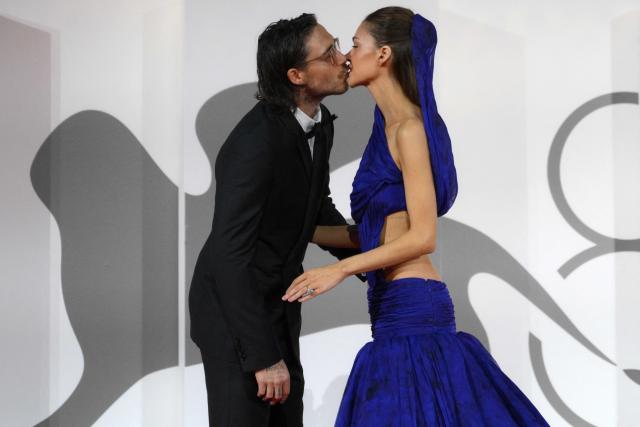 British personality Brooklyn Beckham and British model Nicola Peltz kiss on the red carpet during the 83rd International Venice Film Festival, at Venice Lido on September 5, 2026. (Photo by Tiziana FABI / AFP)