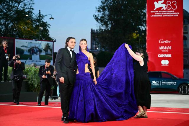 British personality Brooklyn Beckham and British model Nicola Peltz pose on the red carpet during the 83rd International Venice Film Festival, at Venice Lido on September 5, 2026. (Photo by Stefano Rellandini / AFP)