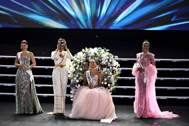 Thailand’s Opal Suchata Chuangsri Miss World 2025  (L) prepares to crown Joheirry Mola Dominguez of the Dominican Republic  after winning the 75th Anniversary Miss World final at the 2 April Square in Nha Trang , Khanh Hoa Province, on September 5, 2026. (Photo by Nhac NGUYEN / AFP)