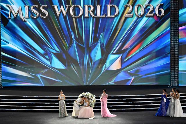 Joheirry Mola Dominguez of the Dominican Republic is congratulated by Thailand’s Opal Suchata Chuangsri Miss World 2025 after winning the 75th Anniversary Miss World 2026 pageant at the 2 April Square in Nha Trang , Khanh Hoa Province, on September 5, 2026. (Photo by Nhac NGUYEN / AFP)