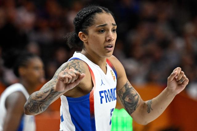 France's forward #15 Gabby Williams plays during the 2026 FIBA Women's Basketball World Cup Group B match between France and South Korea at the Berlin Arena in Berlin on September 5, 2026. (Photo by Tobias SCHWARZ / AFP)