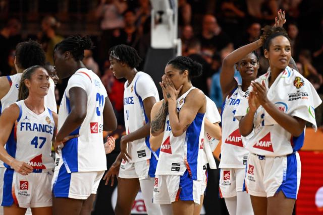 France's players including France's forward #15 Gabby Williams (C) react after the 2026 FIBA Women's Basketball World Cup Group B match between France and South Korea at the Berlin Arena in Berlin on September 5, 2026. (Photo by Tobias SCHWARZ / AFP)