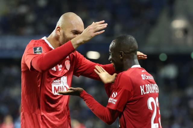 Brest's Malian midfielder #23 Kamory Doumbia (R) celebrates with teammate Brest's French forward #19 Ludovic Ajorque during the French L1 football match between Le Havre AC and Stade Brestois 29 (Brest) at the Stade Oceane in Le Havre, northwestern France, on September 5 , 2026. (Photo by Alain JOCARD / AFP)