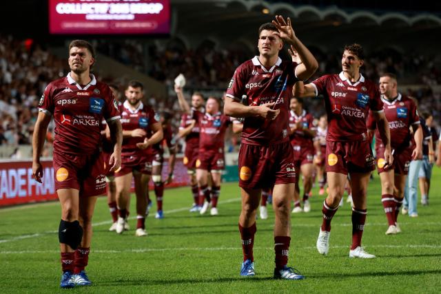 Bordeaux-Bègles' French fly-half Matthieu Jalibert (L) and Bordeaux-Bègles' French centre Nicolas Depoortère (R) celbrate after winning the French Top 14 rugby union match between Union Bordeaux Begles (UBB) and Racing 92 at the Chaban-Delmas Stadium in Bordeaux, southwestern France, on September 5, 2026. (Photo by ROMAIN PERROCHEAU / AFP)
