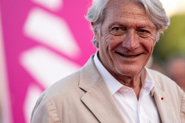 Deauville mayor Philippe Augier poses on the red carpet during the 52nd edition of the Deauville American film festival, in Deauville, northwestern France on September 5, 2026. (Photo by Guillaume SALIGOT / AFP)