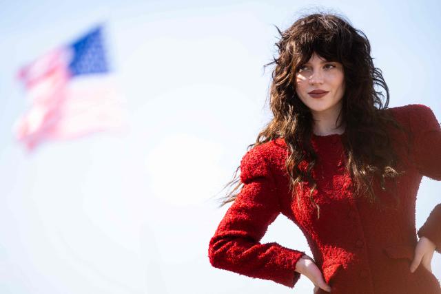 US actress Sophie Thatcher poses for a photo-call on the Promenade des Plancheswhile a US flag is waving behind during the 52nd edition of the Deauville American film festival, in Deauville, northwestern France on September 5, 2026. (Photo by Guillaume SALIGOT / AFP)