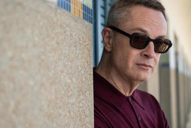 Danish film director Nicolas Winding Refn poses in front of beach cabins during a photo session during the 52nd edition of the Deauville American film festival, in Deauville, northwestern France on September 5, 2026. (Photo by Guillaume SALIGOT / AFP)