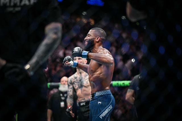 French Salahdine Parnasse celebrates after winning against New Zealand Dan Hooker during the lightweight division during their mixed martial arts (MMA) at the 5th edition of the Ultimate Fighting Championship (UFC) at the Bercy Accor Arena, in Paris, on September 5, 2026. (Photo by LOU BENOIST / AFP)
