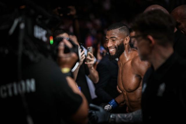 French Salahdine Parnasse celebrates after winning against New Zealand Dan Hooker during the lightweight division during their mixed martial arts (MMA) at the 5th edition of the Ultimate Fighting Championship (UFC) at the Bercy Accor Arena, in Paris, on September 5, 2026. (Photo by LOU BENOIST / AFP)