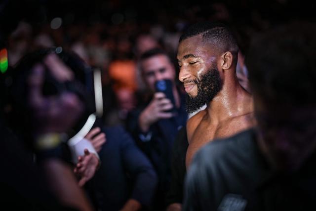 French Salahdine Parnasse celebrates after winning against New Zealand Dan Hooker during the lightweight division during their mixed martial arts (MMA) at the 5th edition of the Ultimate Fighting Championship (UFC) at the Bercy Accor Arena, in Paris, on September 5, 2026. (Photo by LOU BENOIST / AFP)