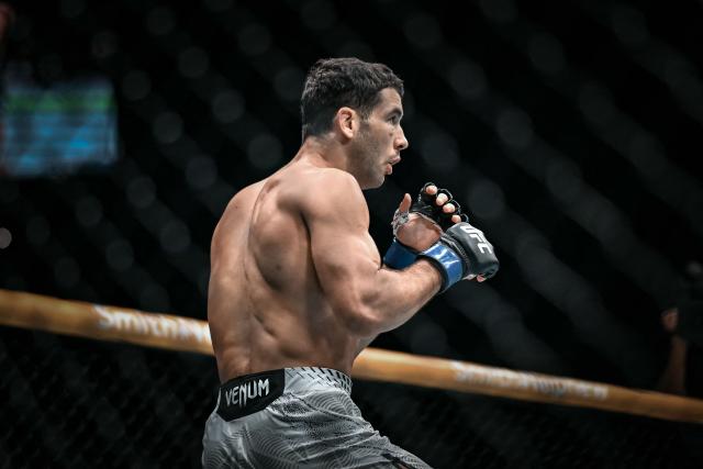 France's Axel Sola fights with France's Fares Ziam (unseen) during their mixed martial arts (MMA) at the 5th edition of the Ultimate Fighting Championship (UFC) at the Bercy Accor Arena, in Paris, on September 5, 2026. (Photo by LOU BENOIST / AFP)