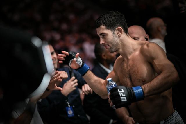 France's Axel Sola celebrates after his fights with France's Fares Ziam (unseen) during their mixed martial arts (MMA) at the 5th edition of the Ultimate Fighting Championship (UFC) at the Bercy Accor Arena, in Paris, on September 5, 2026. (Photo by LOU BENOIST / AFP)