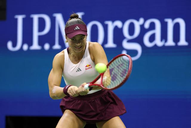USA's Iva Jovic hits a return to Philippines' Alexandra Eala during their women's singles third round tennis match on day seven of the US Open tennis tournament at the USTA Billie Jean King National Tennis Center in New York City on September 5, 2026. (Photo by Leonardo MUNOZ / AFP)
