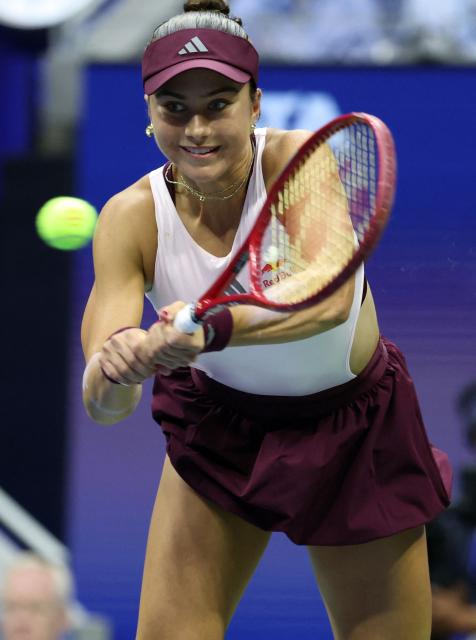 USA's Iva Jovic hits a return to Philippines' Alexandra Eala during their women's singles third round tennis match on day seven of the US Open tennis tournament at the USTA Billie Jean King National Tennis Center in New York City on September 5, 2026. (Photo by Leonardo MUNOZ / AFP)