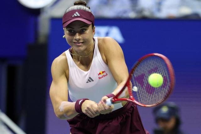 USA's Iva Jovic hits a return to Philippines' Alexandra Eala during their women's singles third round tennis match on day seven of the US Open tennis tournament at the USTA Billie Jean King National Tennis Center in New York City on September 5, 2026. (Photo by Leonardo MUNOZ / AFP)