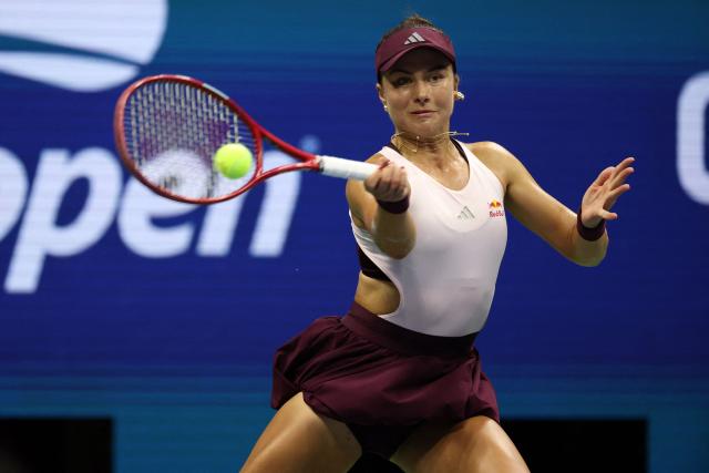 USA's Iva Jovic hits a return to Philippines' Alexandra Eala during their women's singles third round tennis match on day seven of the US Open tennis tournament at the USTA Billie Jean King National Tennis Center in New York City on September 5, 2026. (Photo by Leonardo MUNOZ / AFP)