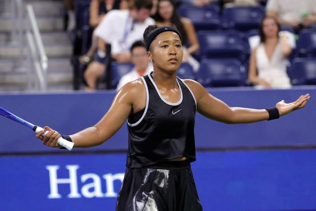 Japan's Naomi Osaka reacts during her women's singles third round tennis match against Belgium’s Elise Mertens on day seven of the US Open tennis tournament at the USTA Billie Jean King National Tennis Center in New York City on September 5, 2026. (Photo by KENA BETANCUR / AFP)