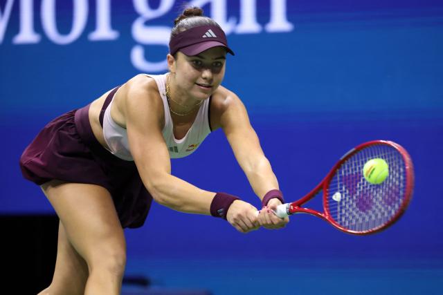 USA's Iva Jovic hits a return to Philippines' Alexandra Eala during their women's singles third round tennis match against on day seven of the US Open tennis tournament at the USTA Billie Jean King National Tennis Center in New York City on September 5, 2026. (Photo by Leonardo MUNOZ / AFP)