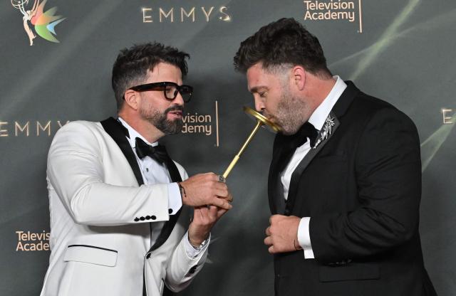 US reality TV personalities Johnny Devenanzio (L) and CT Tamburello (R) attend Night One of the 78th Emmy Awards at the Peacock Theater in Los Angeles on September 5, 2026. (Photo by LISA O`CONNOR / AFP)